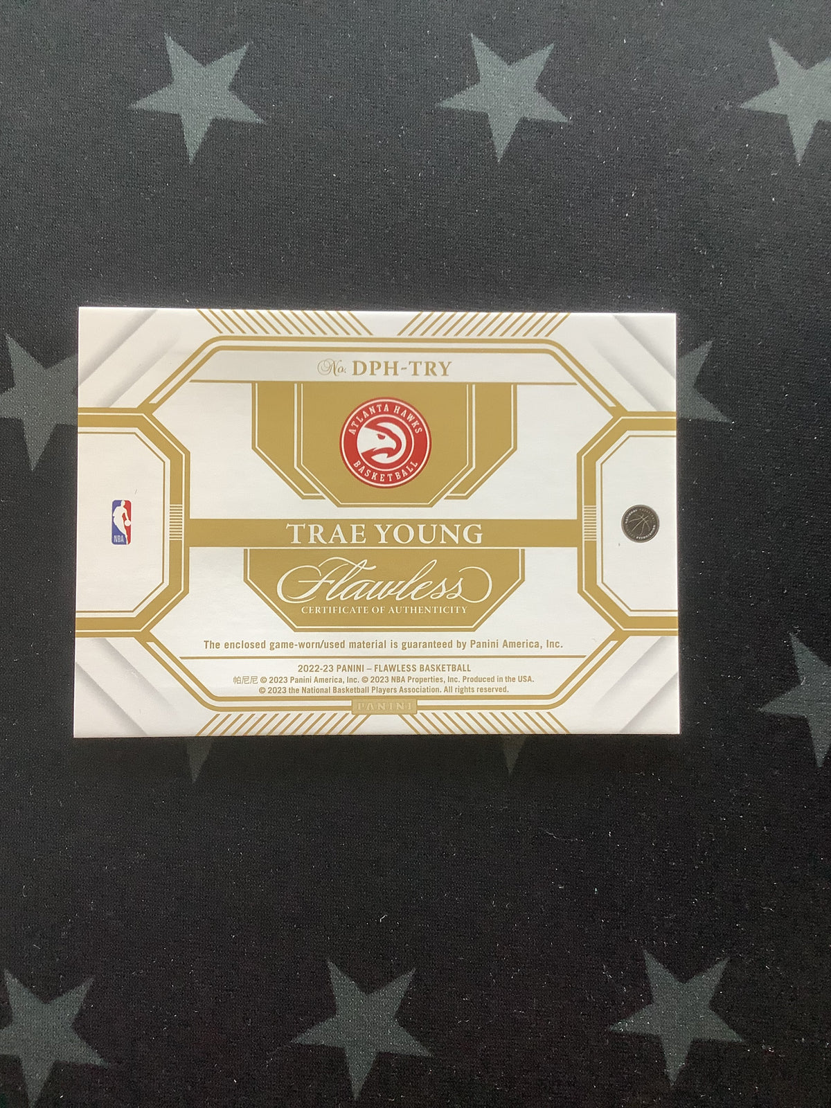 2022-23 Panini Flawless Trae Young Dual Game Worn/Used Jersey Patch Ruby #06/15