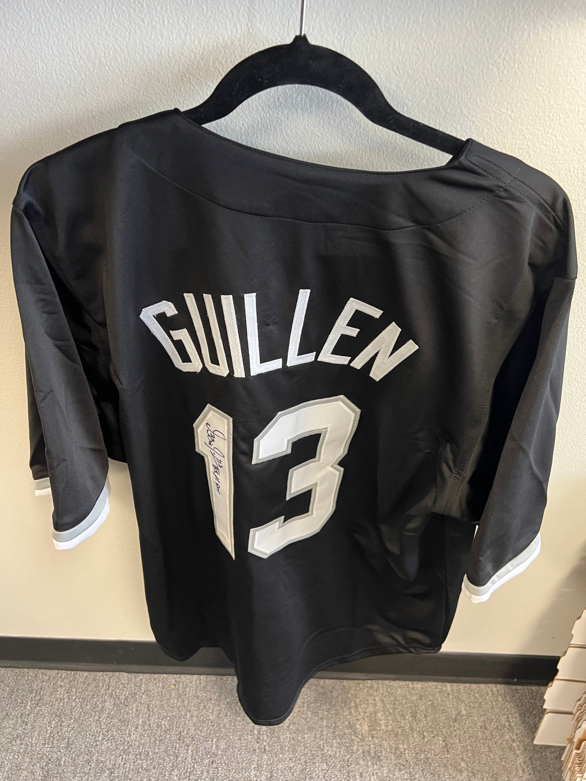 Ozzie Guillen Autographed Jersey "85 AL ROY" Black w/ JSA COA