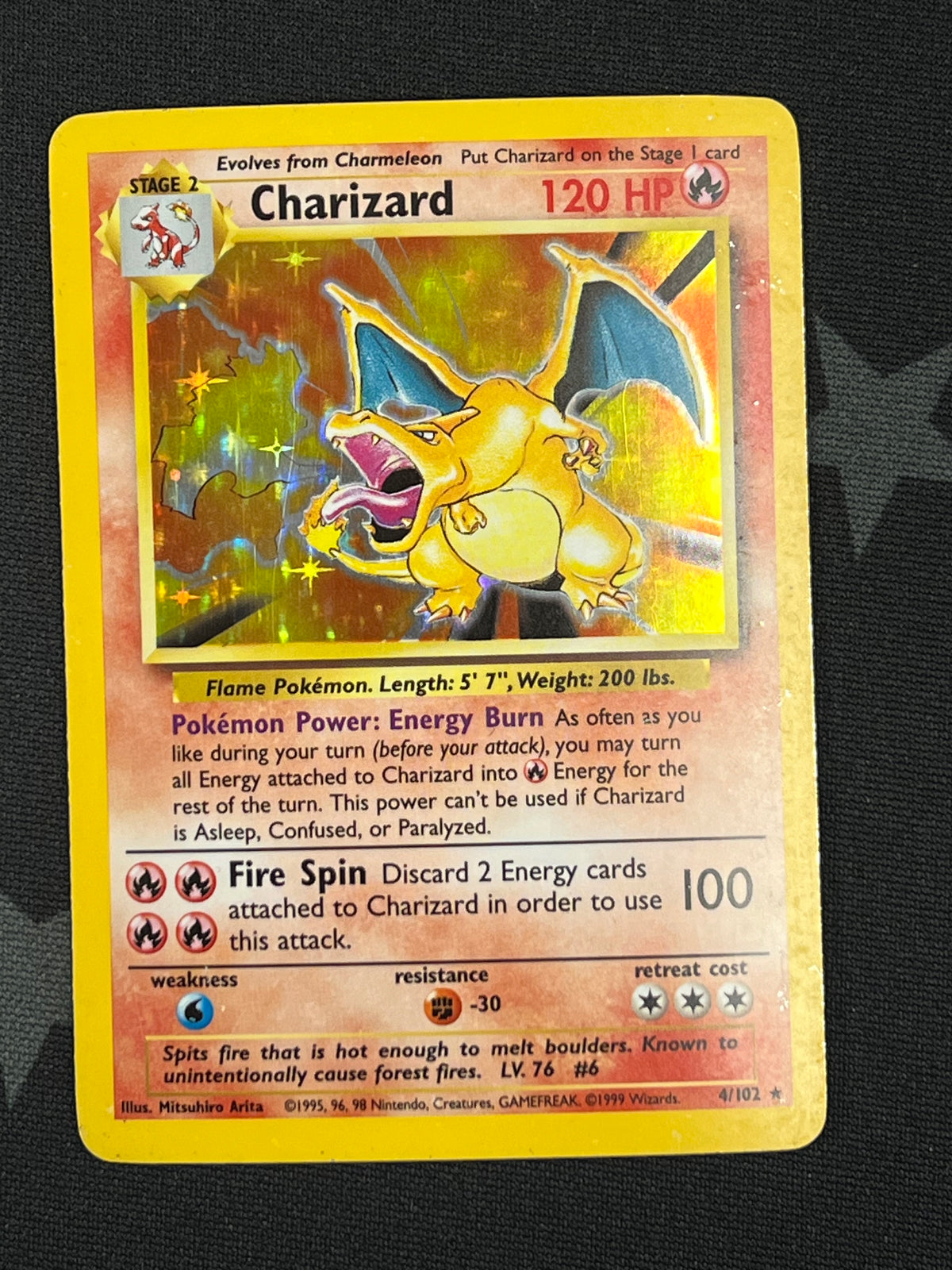 Pokémon Charizard 4/130 Unlimited Holo (Heavily Played)