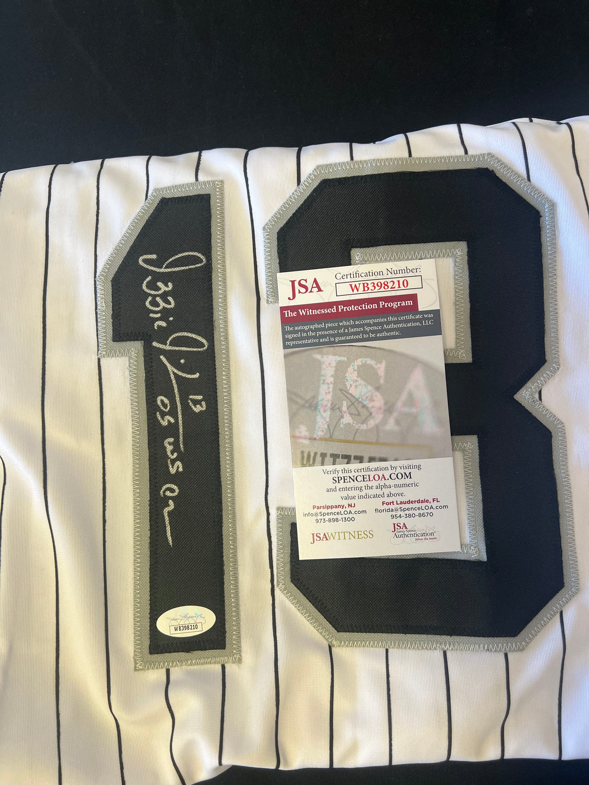 Ozzie Guillen Autographed Jersey "05 WS Champs" White w/ JSA Cert
