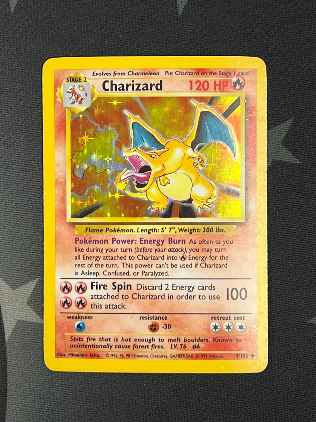 Pokémon Charizard 4/130 Unlimited Holo (Heavily Played)